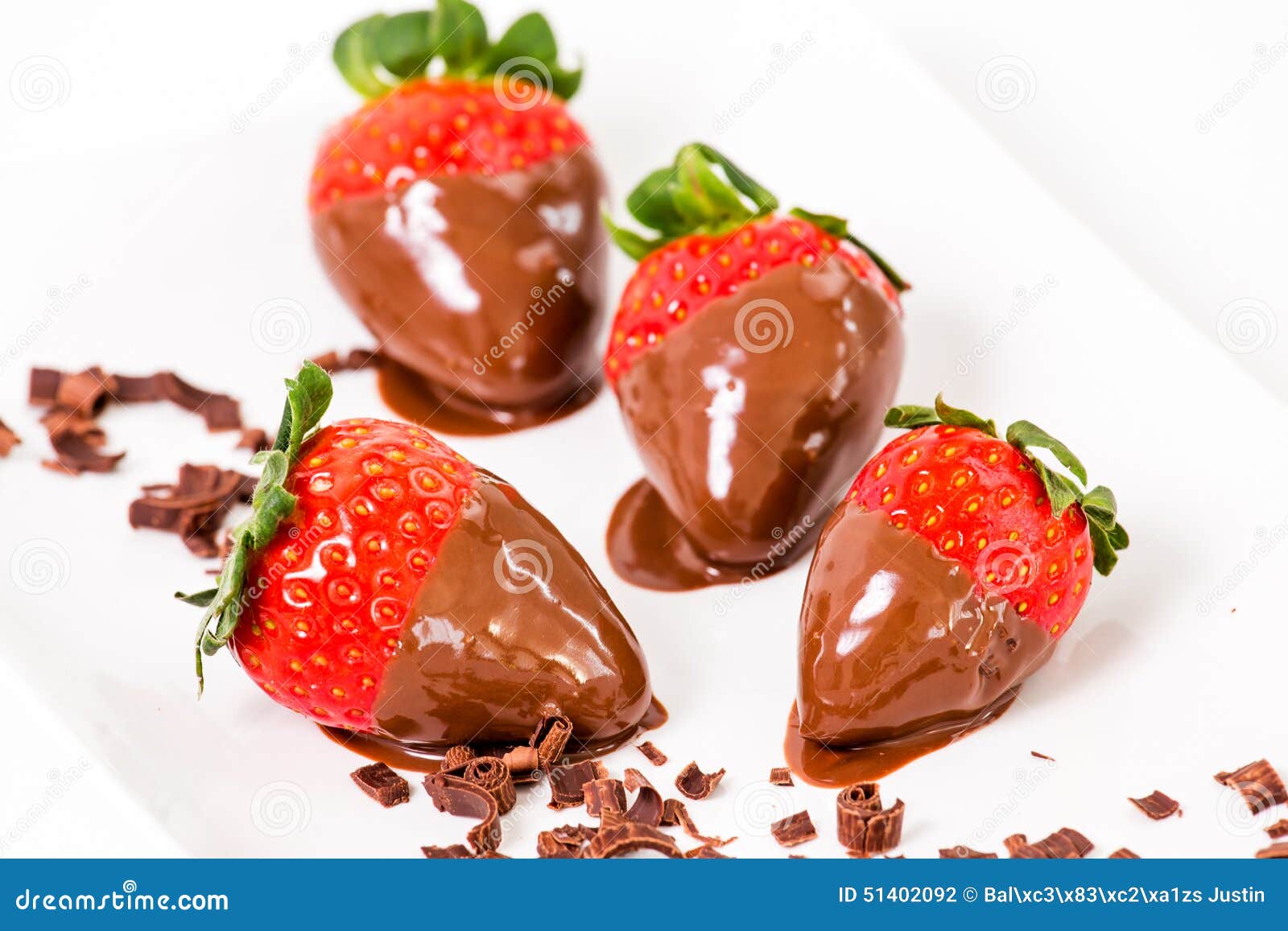 Chocolate Dipped Strawberries, Chocolate Pieces Around Him. Stock Photo
