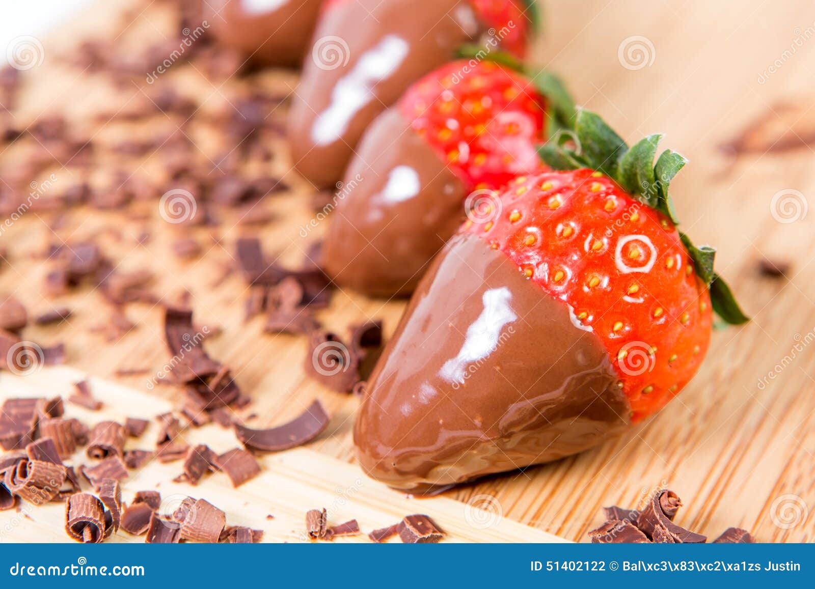 Chocolate Dipped Strawberries, Chocolate Pieces Around Him. Stock Photo