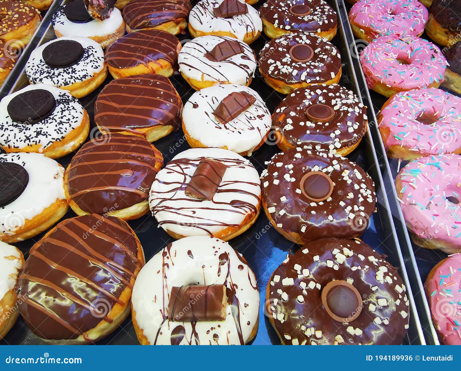 Chocolate Donuts and Fruit Icing Stock Photo - Image of dough, cake ...