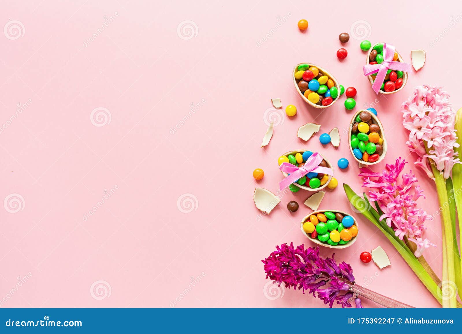 Download Chocolate Easter Eggs And Colorful Candies On Pastel Pink Paper Background. Flat Lay, Top View ...