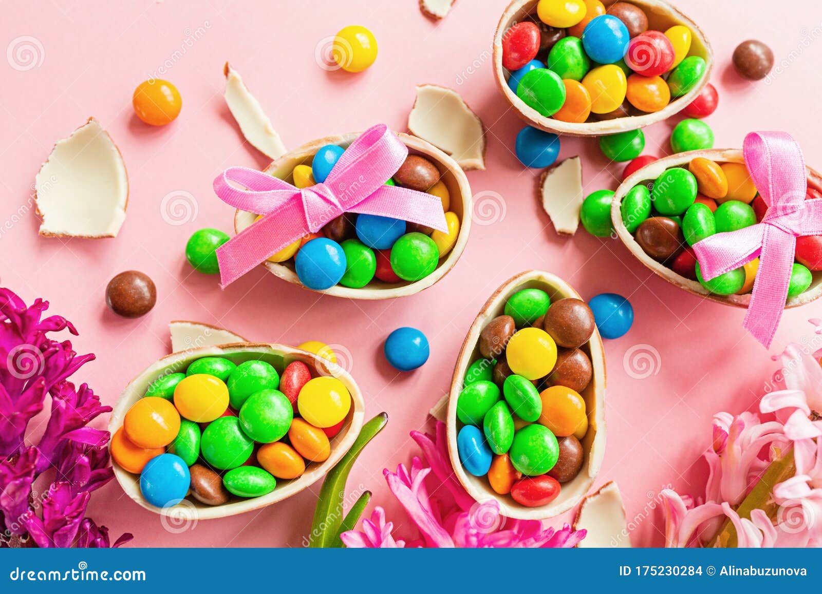 Download Chocolate Easter Eggs And Colorful Candies On Pastel Pink Paper Background. Flat Lay, Top View ...