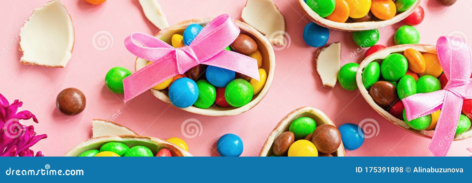 Download Chocolate Easter Eggs And Colorful Candies On Pastel Pink Paper Background. Flat Lay, Top View ...