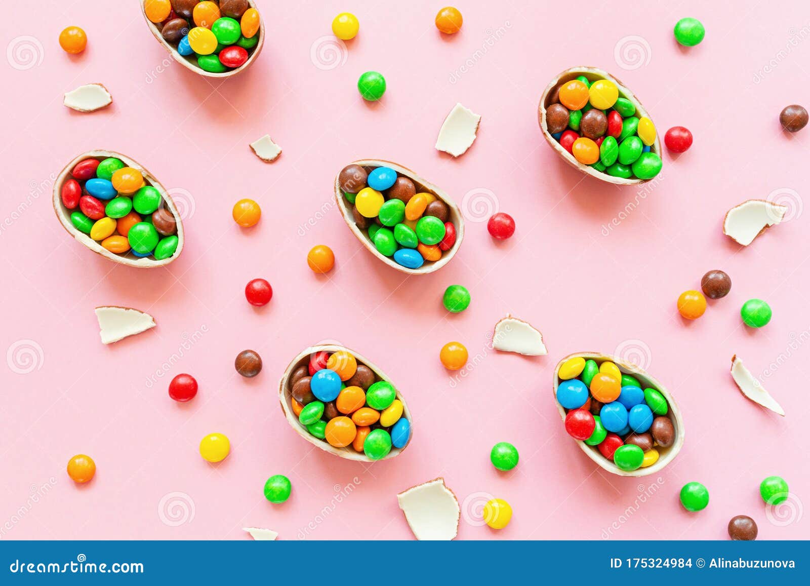 Download Chocolate Easter Eggs And Colorful Candies On Pastel Pink Paper Background. Flat Lay, Top View ...