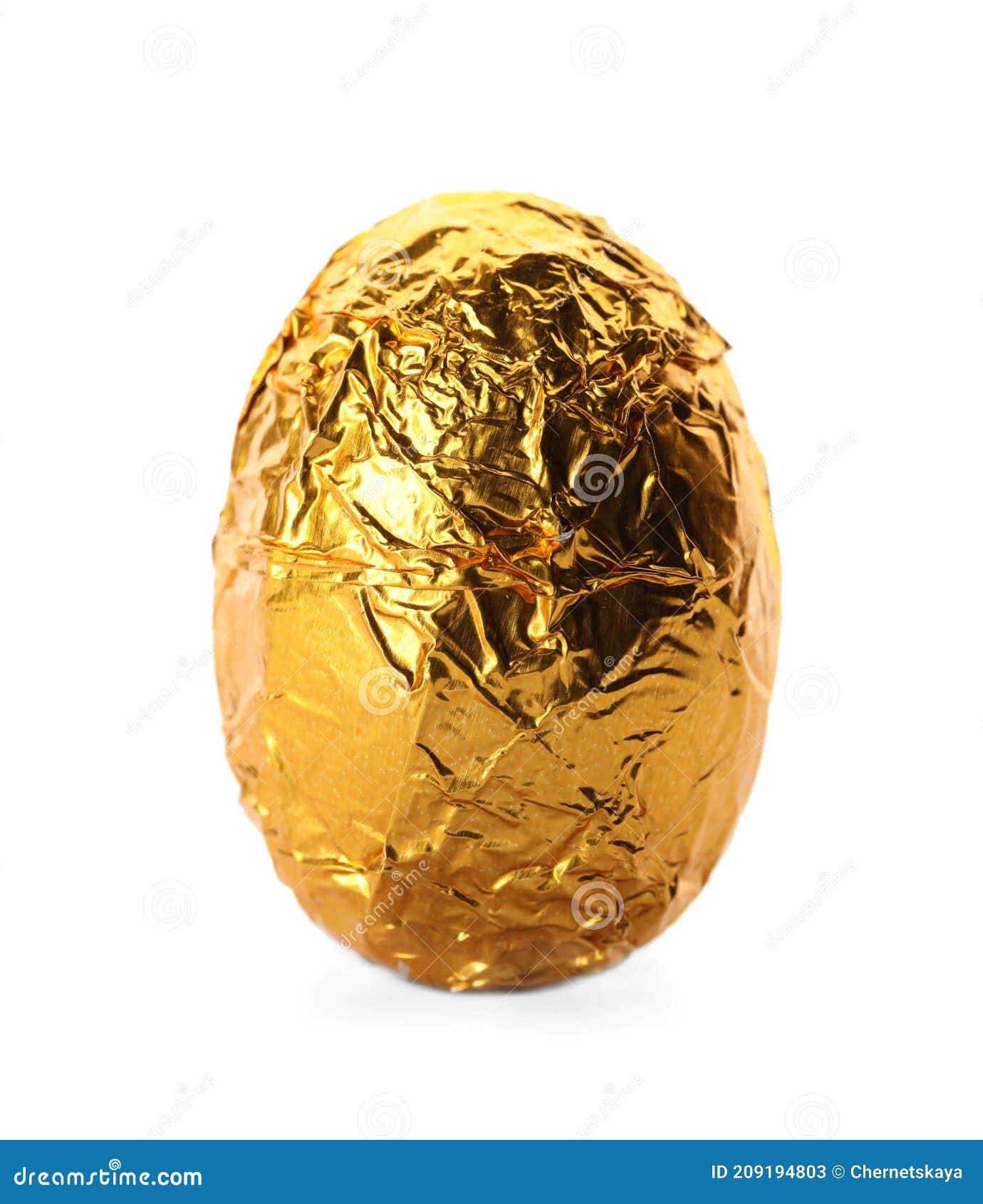 Chocolate Egg Wrapped in Bright Golden Foil Isolated on White Stock