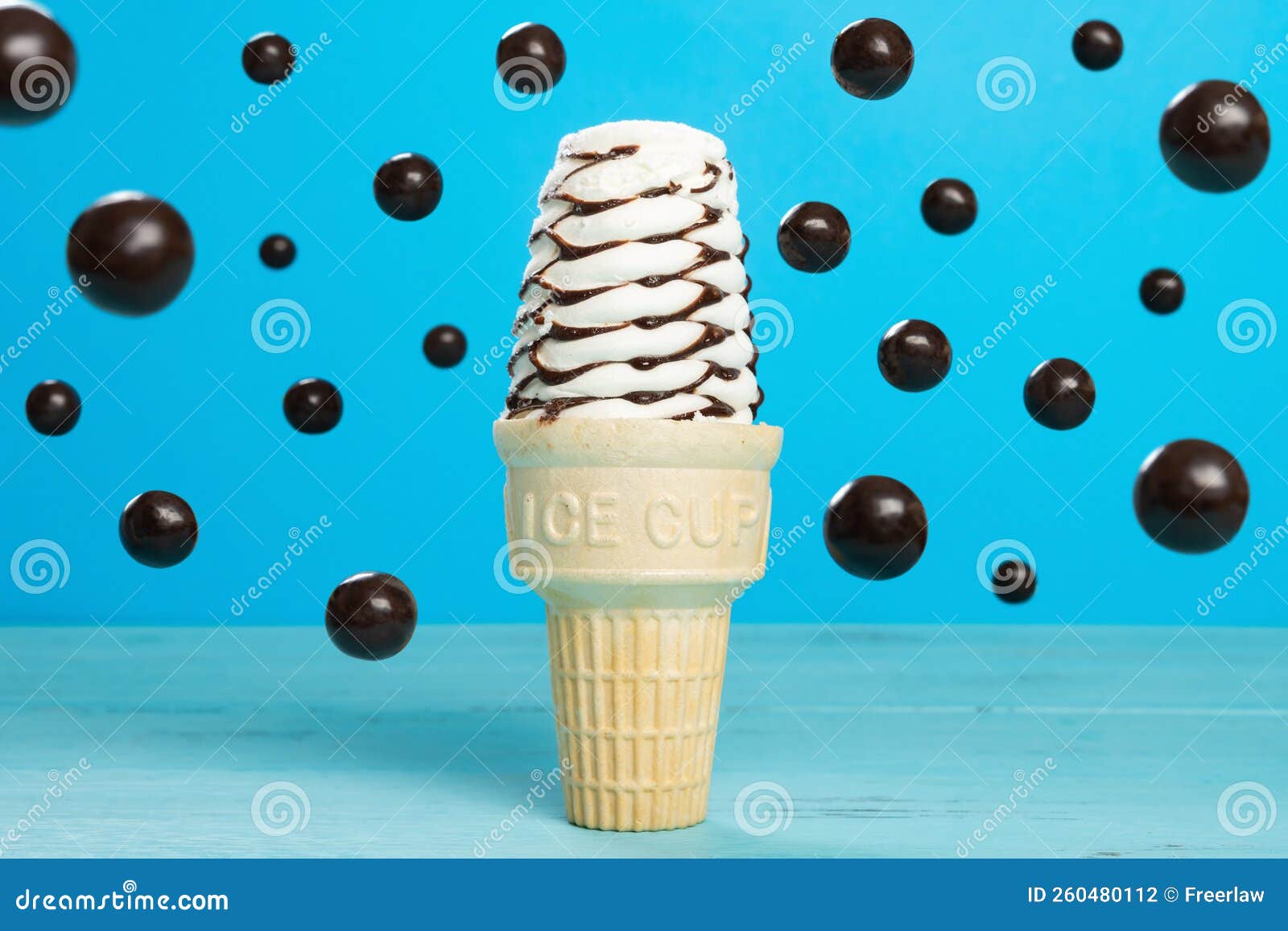 A Chocolate Flavor Ice Cream Cone with Floating Chocolate Candies