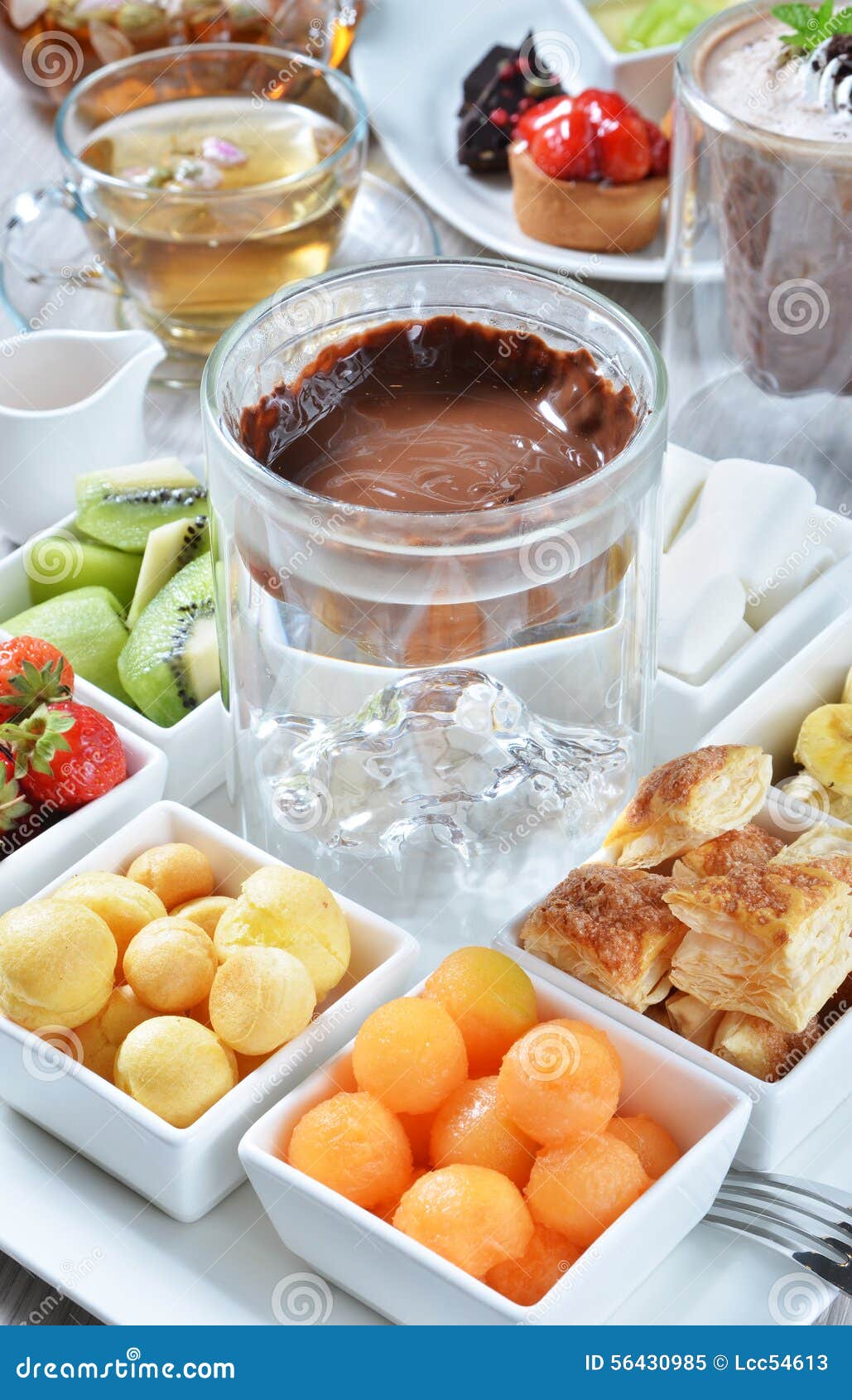 Chocolate fondue stock image. Image of dessert, food 56430985