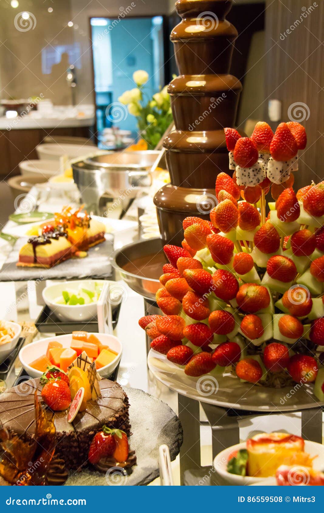 Chocolate Fountain with Fruit Skewers Stock Photo - Image of buffet, tasty:  86559508