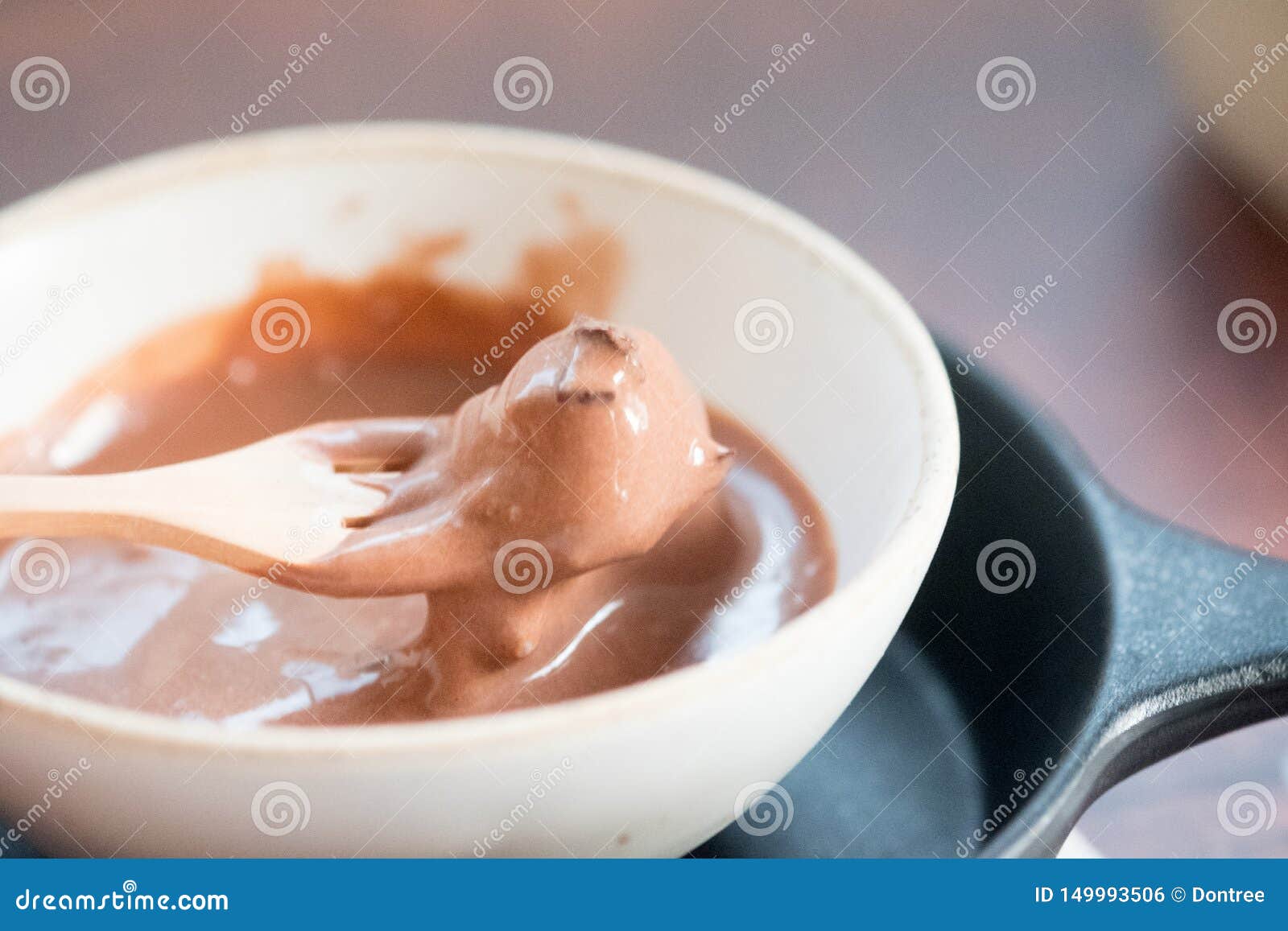 Chocolate Ice Cream in a Melting Process in Bowl Stock Photo Image of