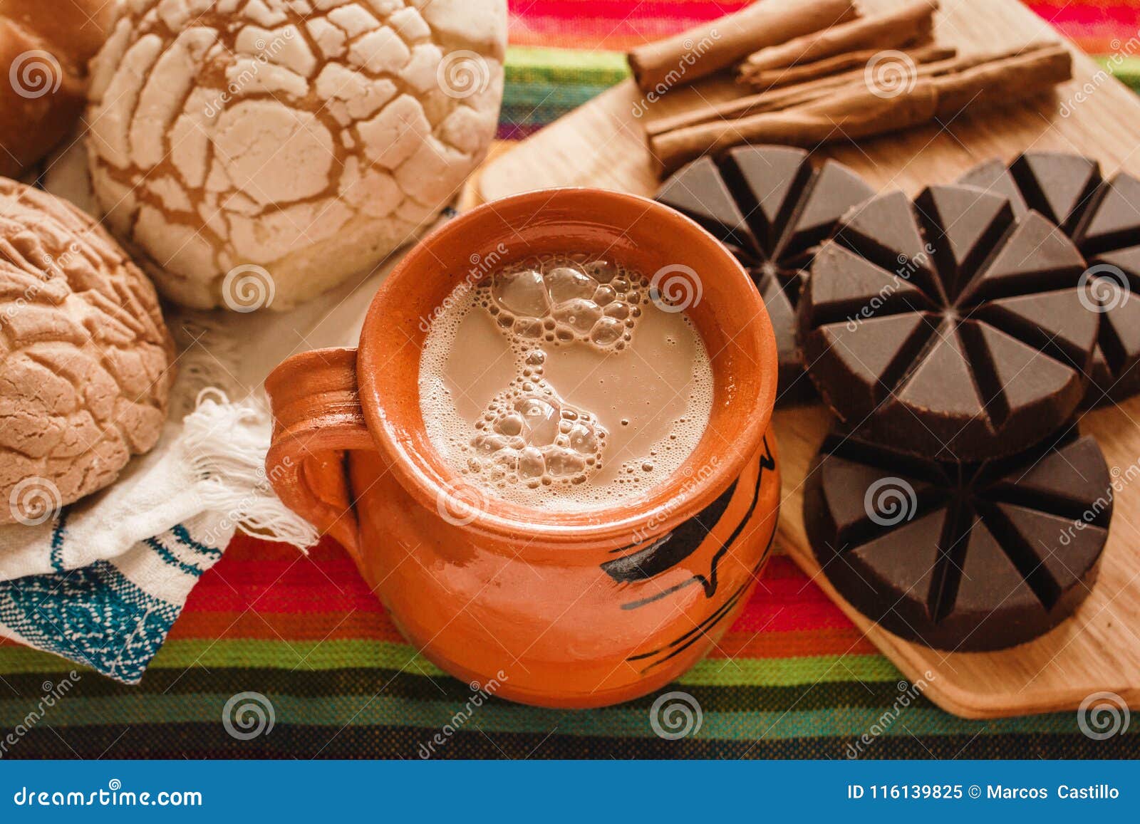 chocolate mexicano and conchas, cup of mexican chocolate from oaxaca mexico