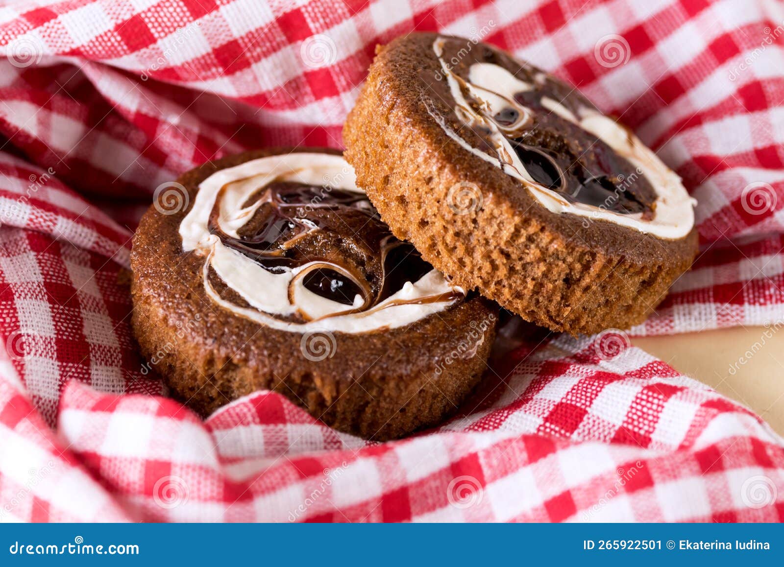 chocolate mini cake with chocolate and vanilla ganash tasty dessert on linen napkin horizontal copy space