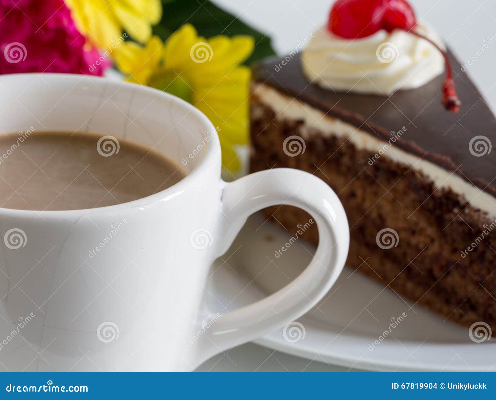 Chocolate Mousse Cake with Whipping Cream and Cherry Topping. Stock