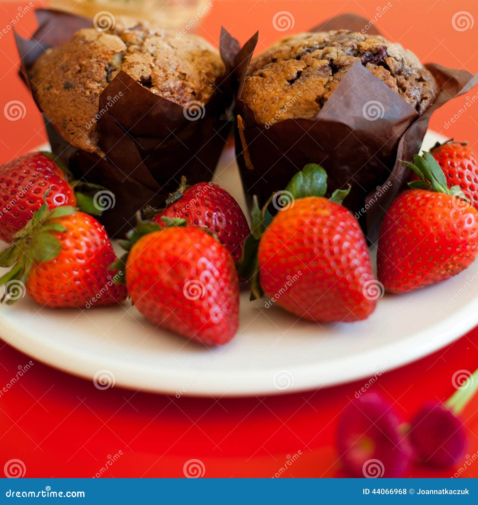 Chocolate Muffins with Strawberries Stock Photo - Image of presented ...