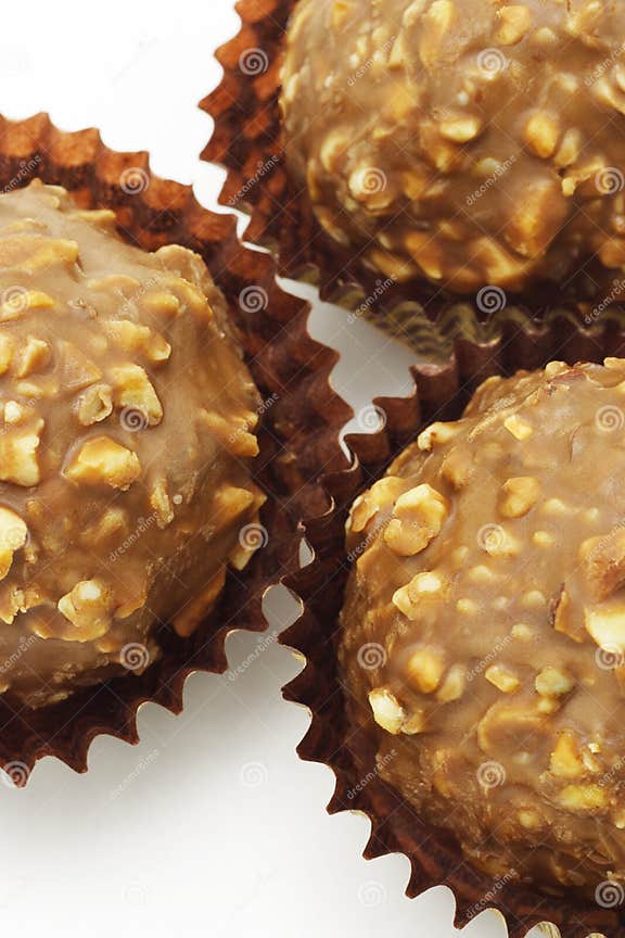 Chocolate and nuts balls stock image. Image of sugar 14587677