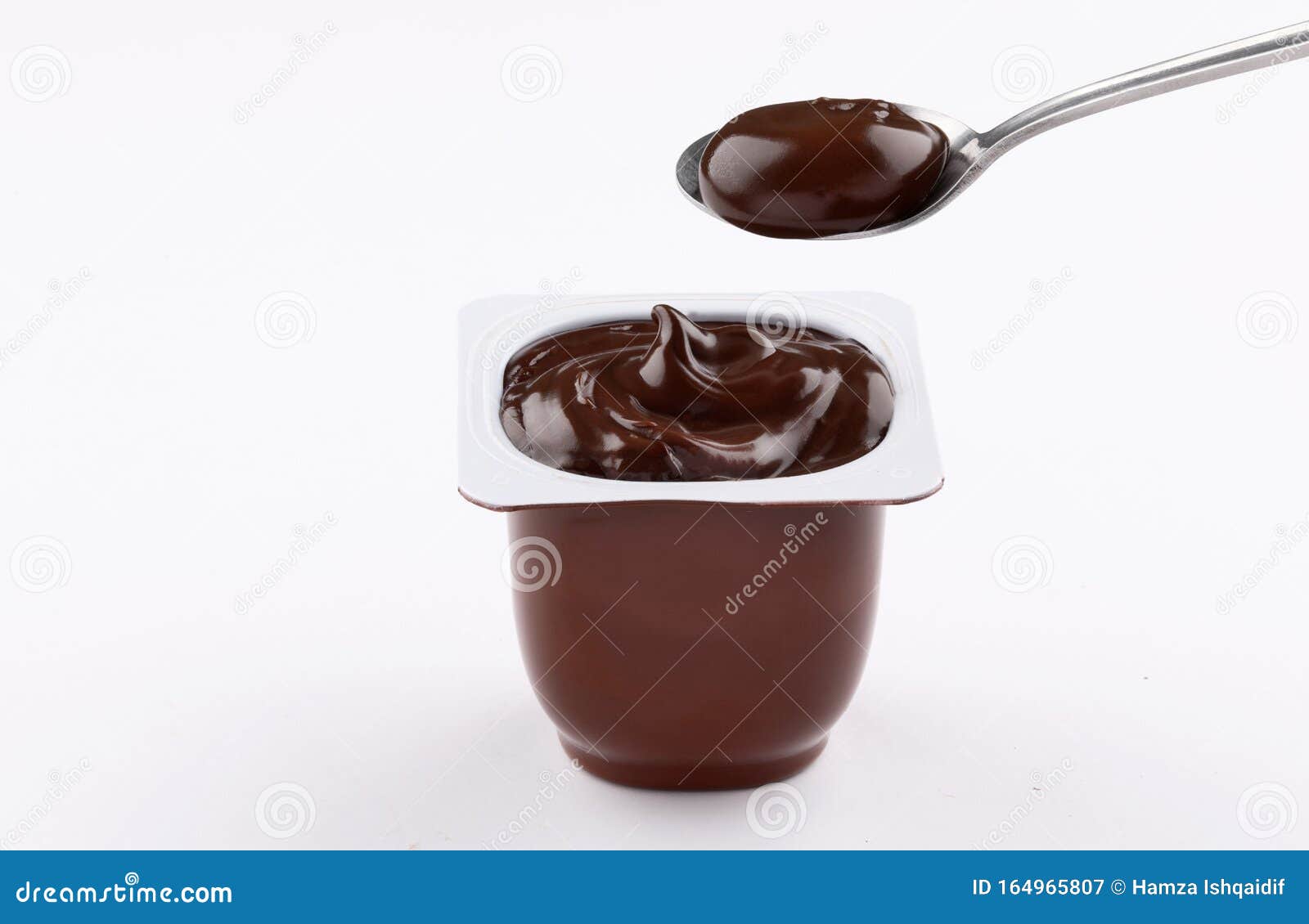 Chocolate Pudding Cup Plastic with Spoon on White Background Stock