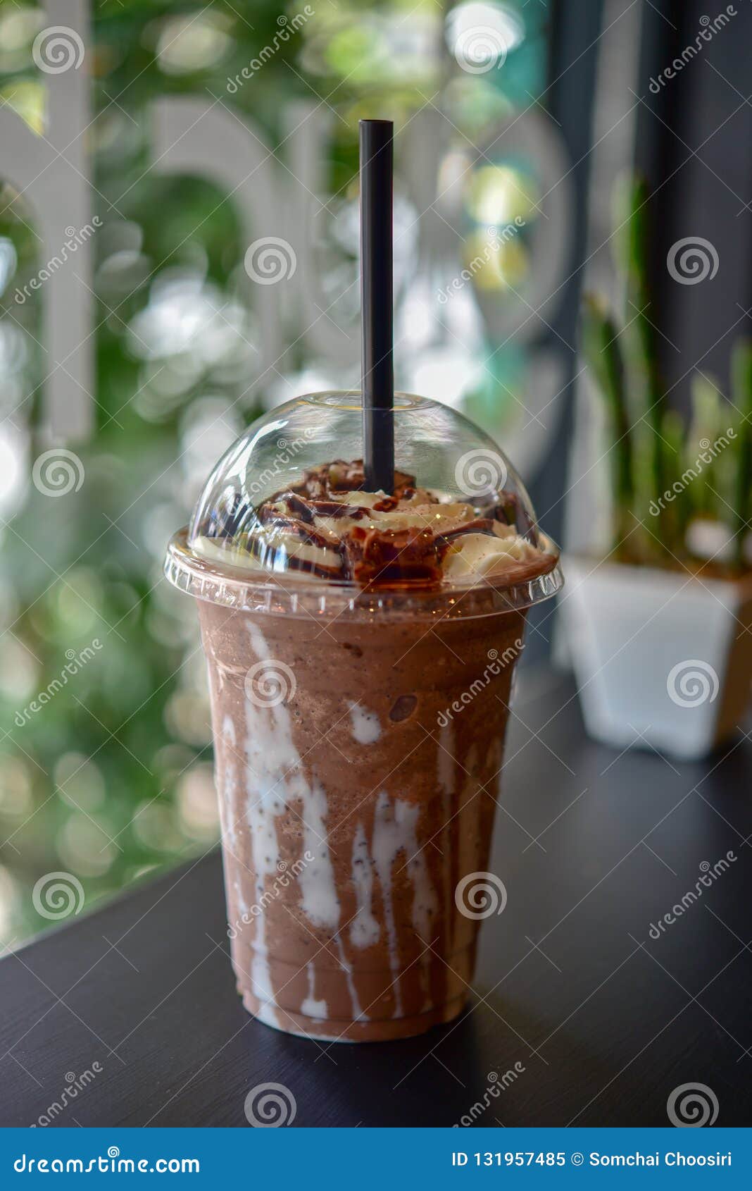 chocolate smoothie milkshake with jar in cafe