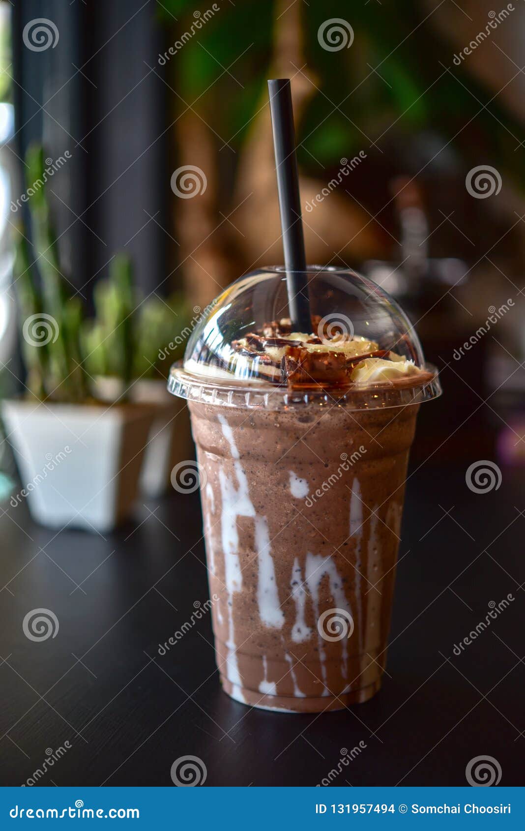 chocolate smoothie milkshake with jar in cafe