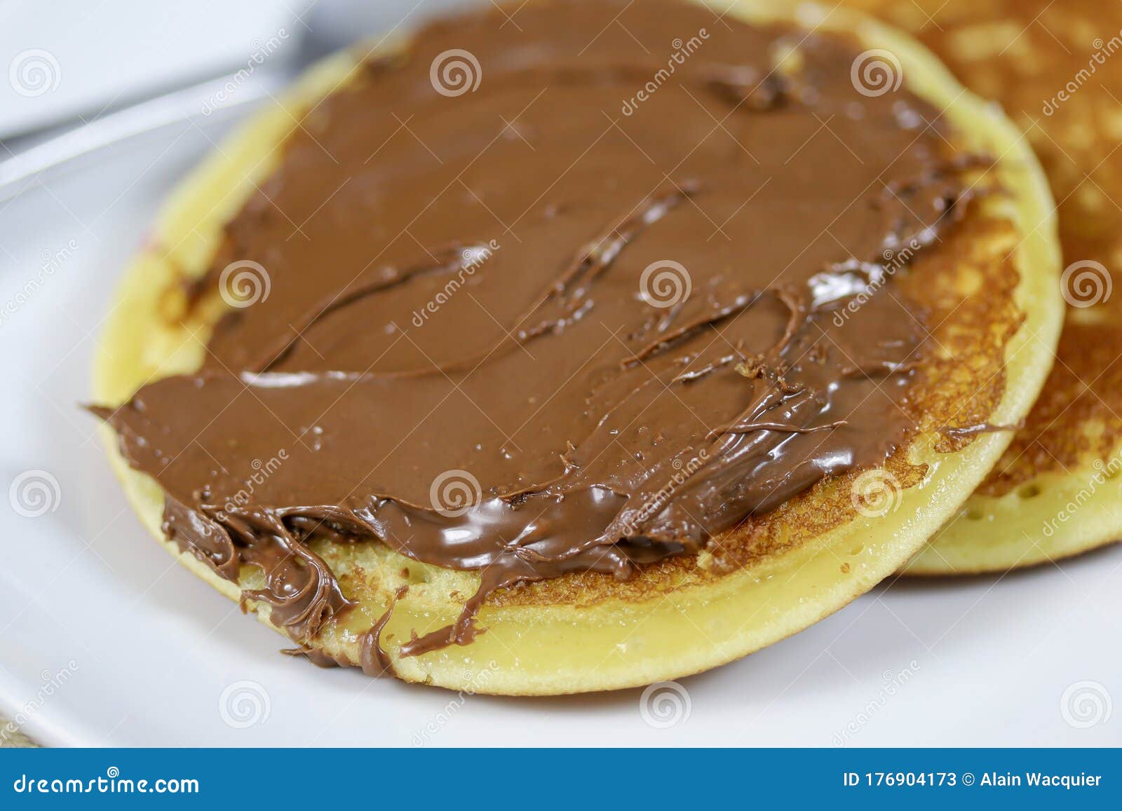 Chocolate spread pancake stock image. Image of hazelnut 176904173