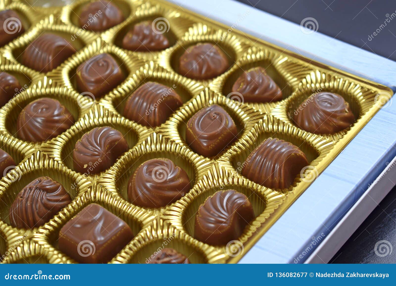 Chocolates in a box. stock image. Image of closeup, holiday 136082677
