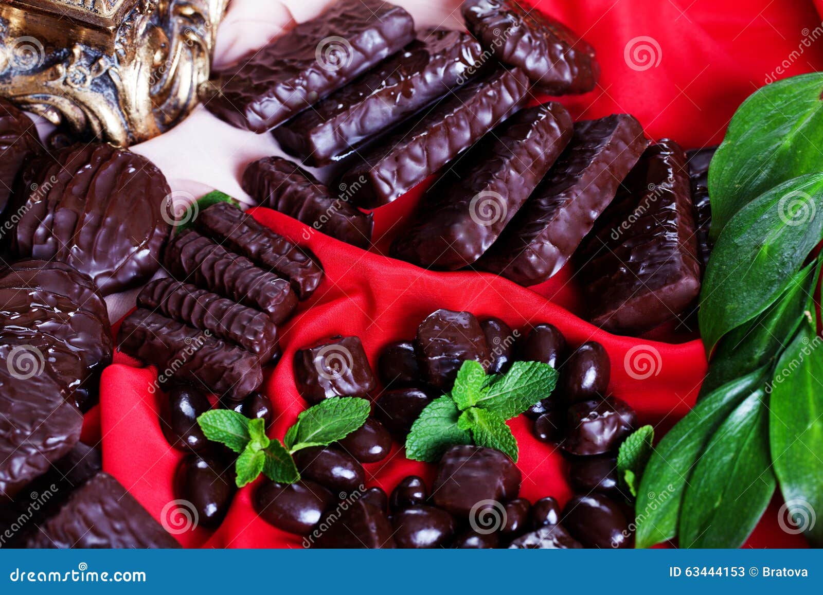Chocolates and Jelly Beans in Bulk on a Red Silk Stock Image Image of