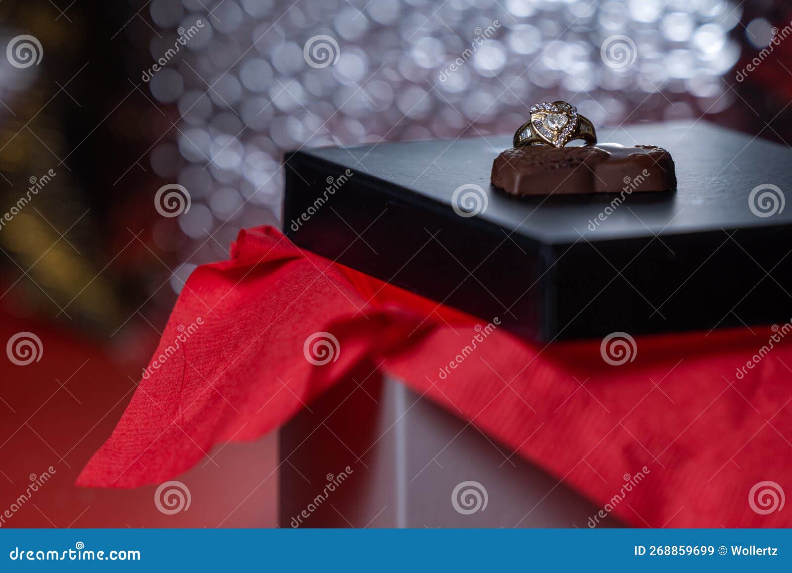Chocolates and a ring stock image. Image of gesture 268859699