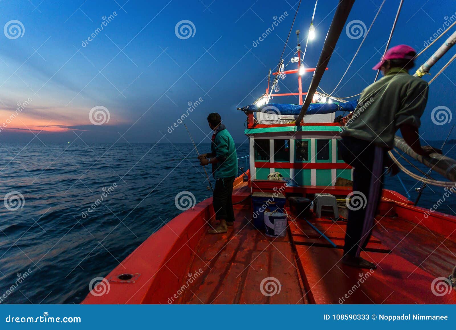 CHONBURI THAILAND - JANUARY 14 2018: fisherman work and travel by fisherman boat with fishing rod and fisherman gears on JANUARY 14, 2018 at SAMAE SAN in CHONBURI THAILAND