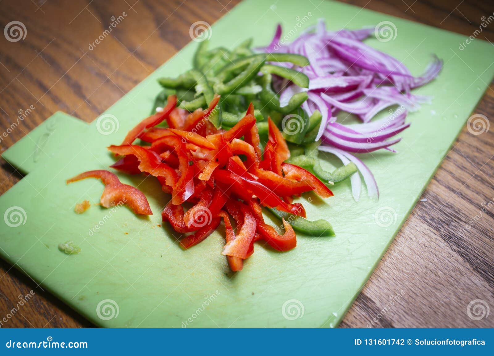 chopped vegetables on kitchen table, preparing salad