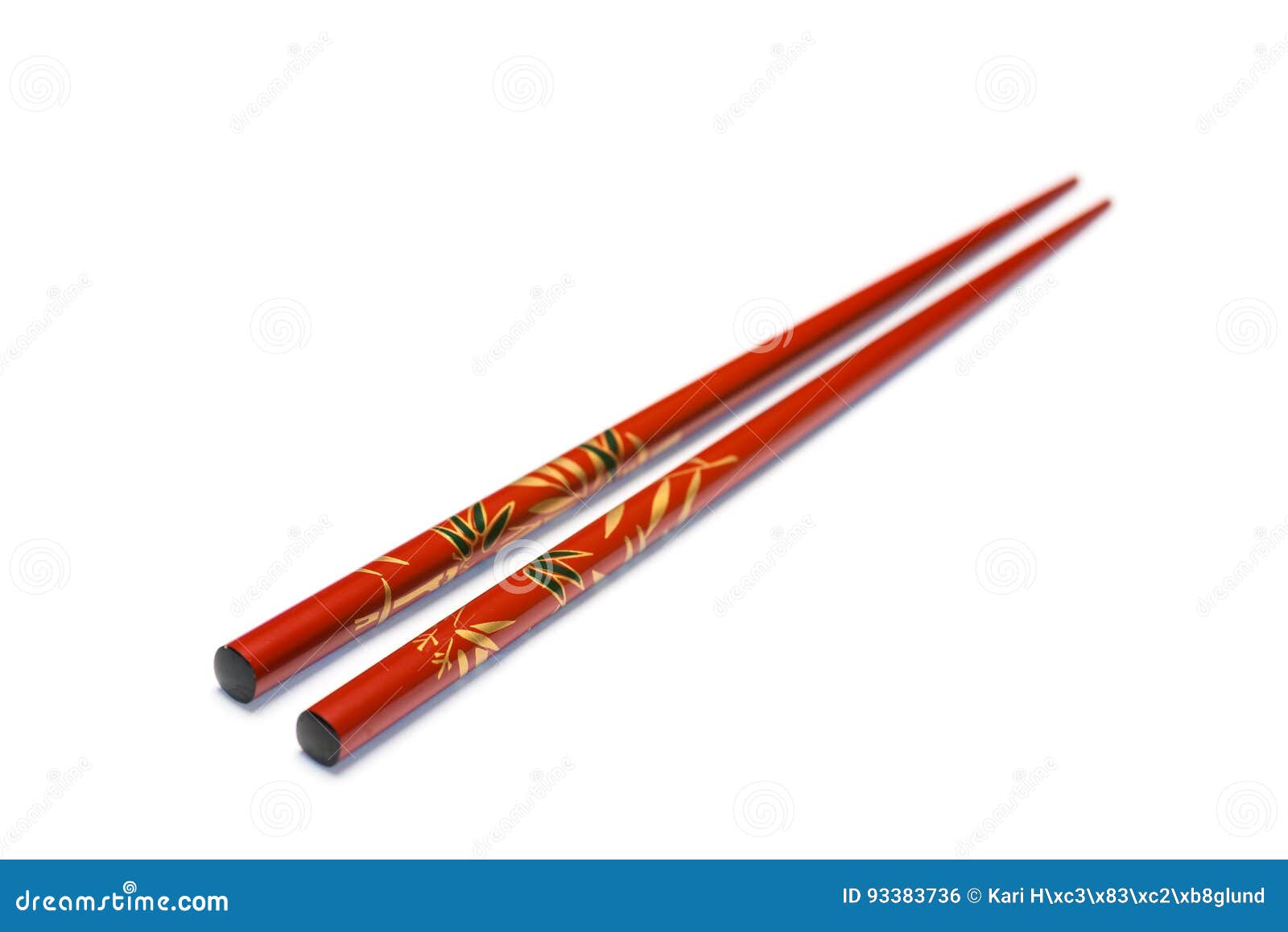 chopsticks on white background with selective focus