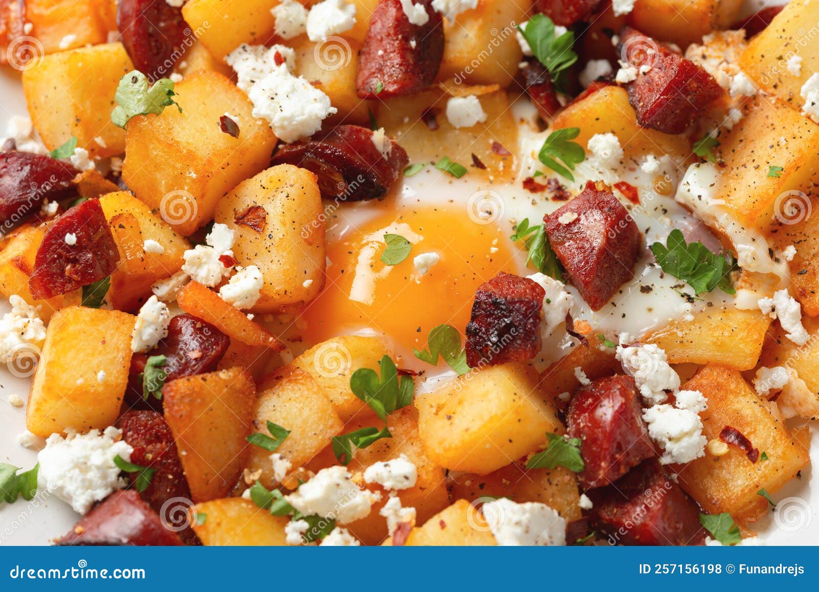 Chorizo Potato Hash Breakfast with Eggs and Feta Cheese Stock Photo