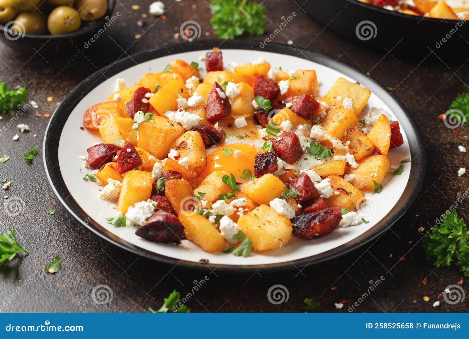 Chorizo Potato Hash Breakfast with Eggs and Feta Cheese Stock Photo