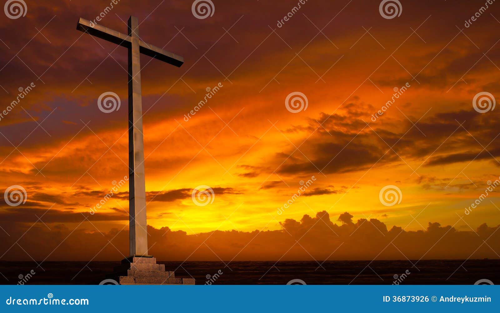 christian cross on sunset sky. religion concept.