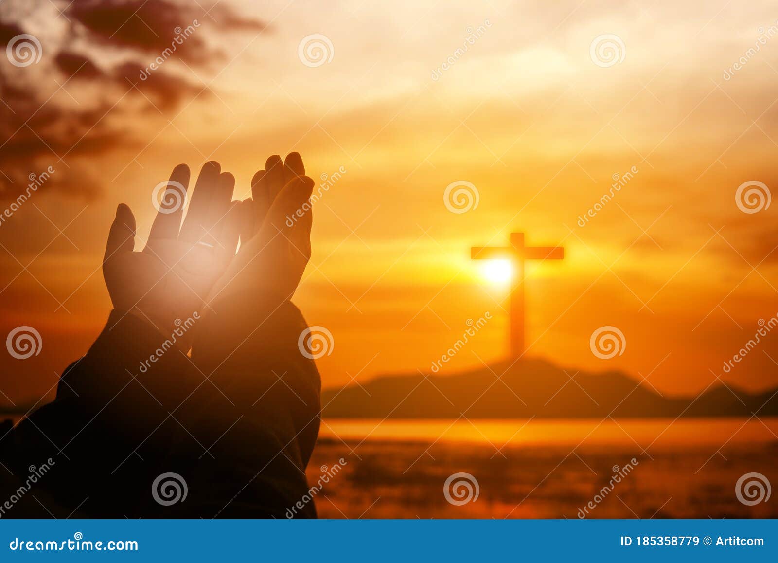 christian woman praying worship at sunset. hands folded in prayer. worship god with christian concept religion. eucharist therapy