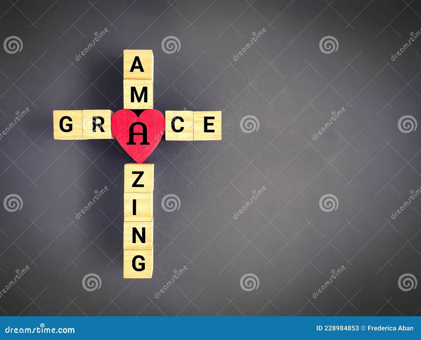 christianity concept -  text of amazing grace on cross d background. stock photo.