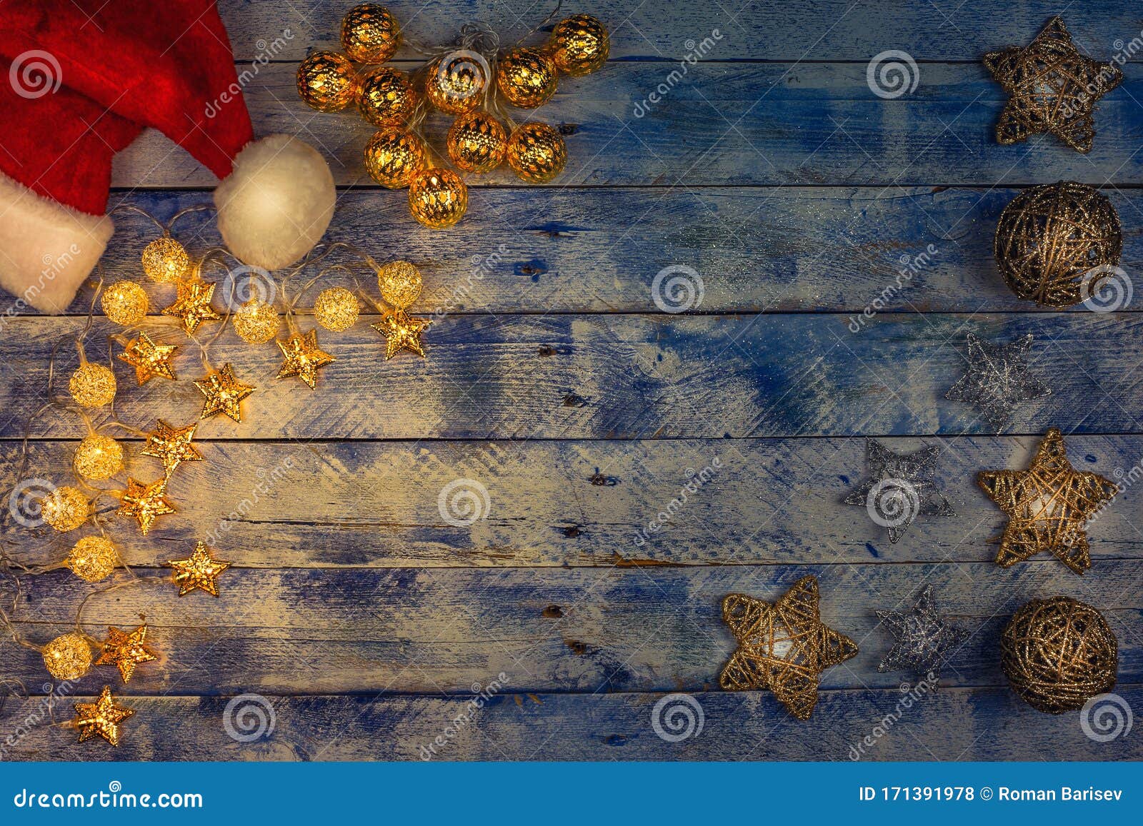 Christmas Background with Santa Hat and Christmas Lights on Rustic ...