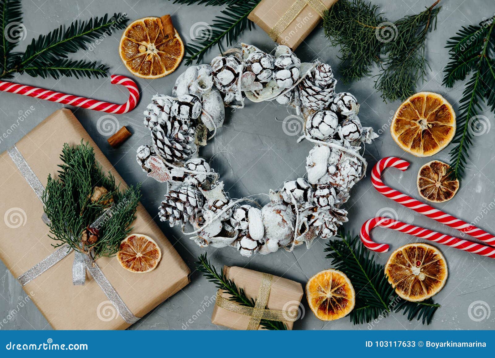 Download Christmas Background With A Wreath Candy And Gifts A Gray Ba Stock Image