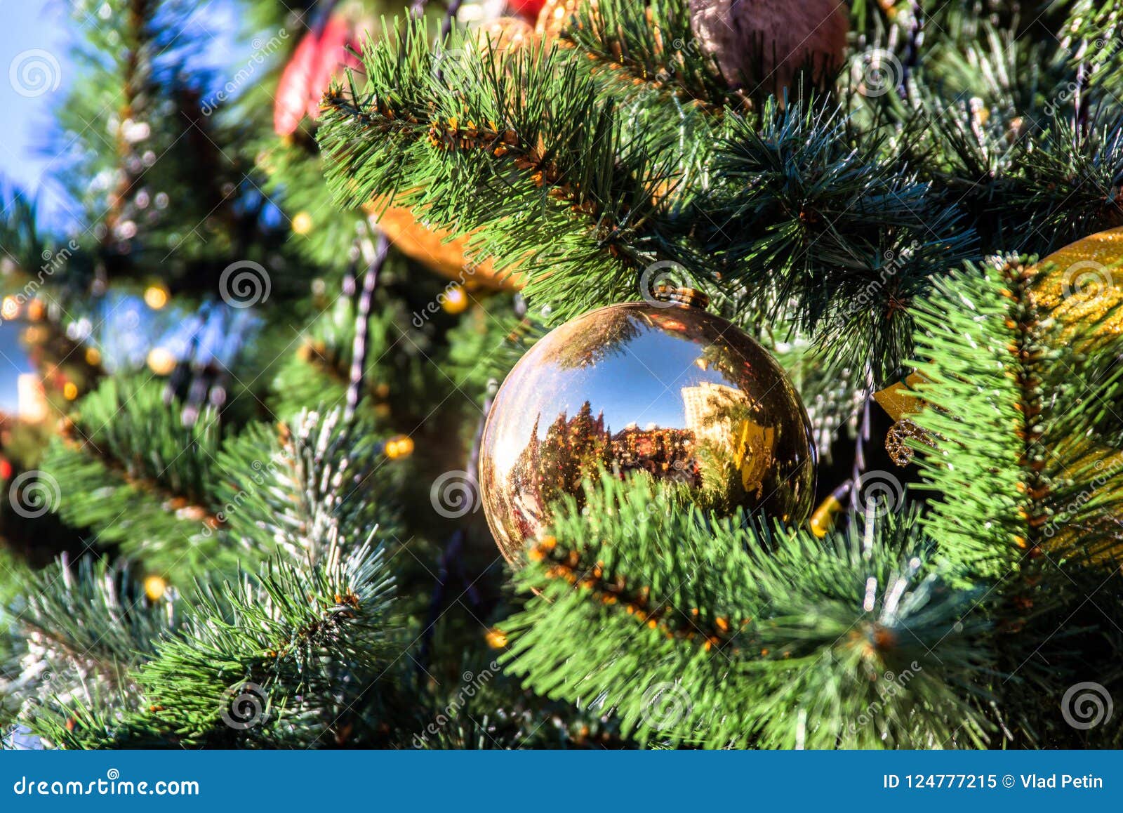 Christmas ball on branch stock image. Image of gold - 124777215