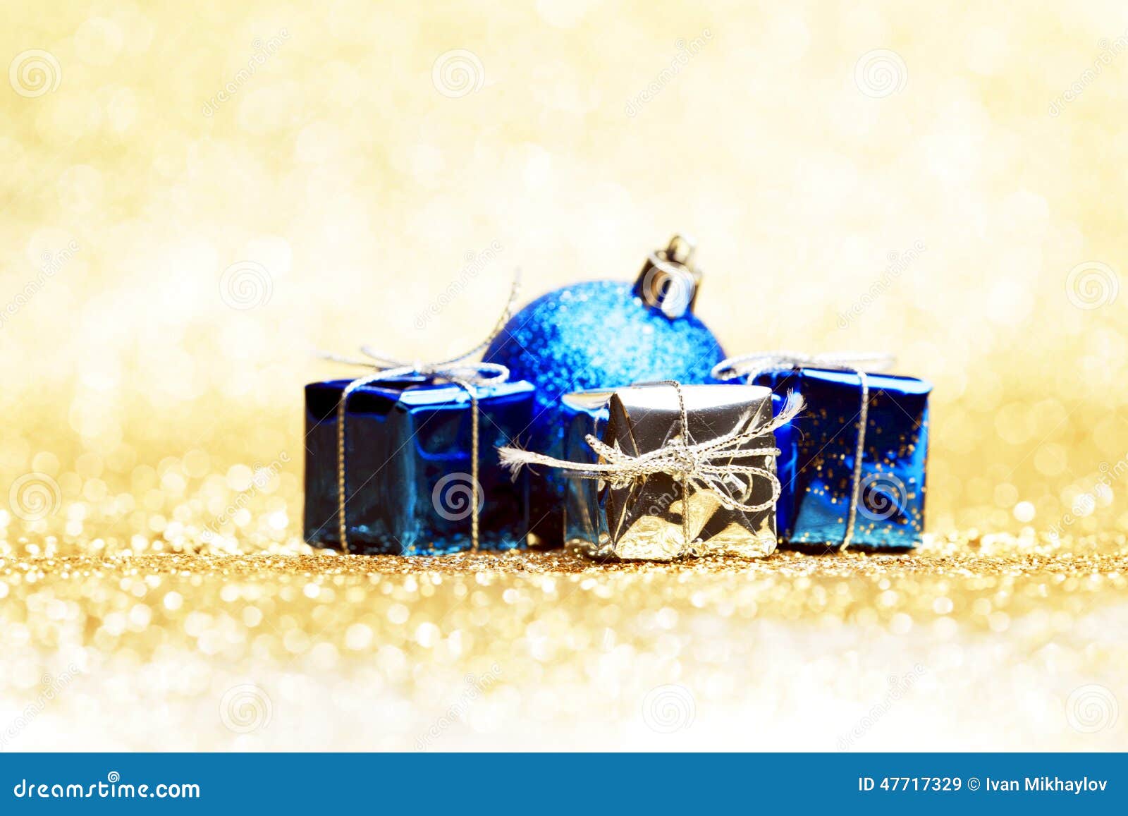 Christmas ball and gifts stock image. Image of present 47717329