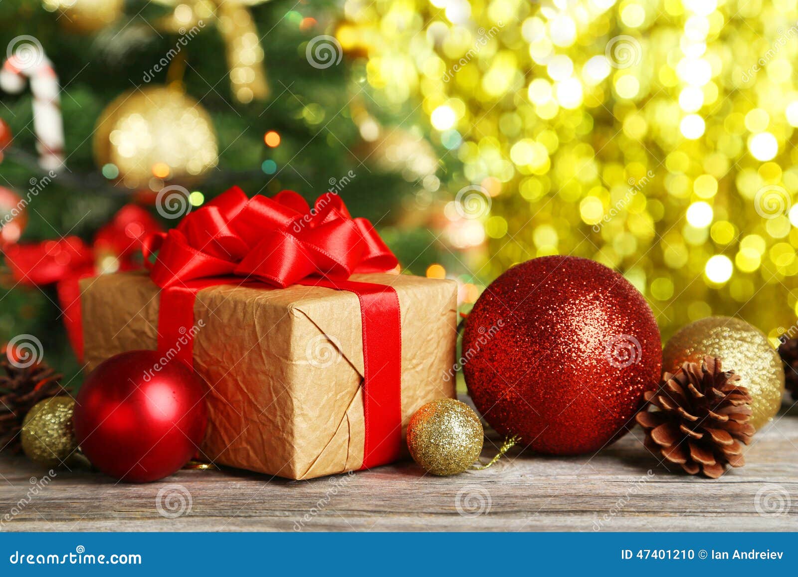 Christmas Balls and Christmas Gift on Wooden Background Stock Photo ...