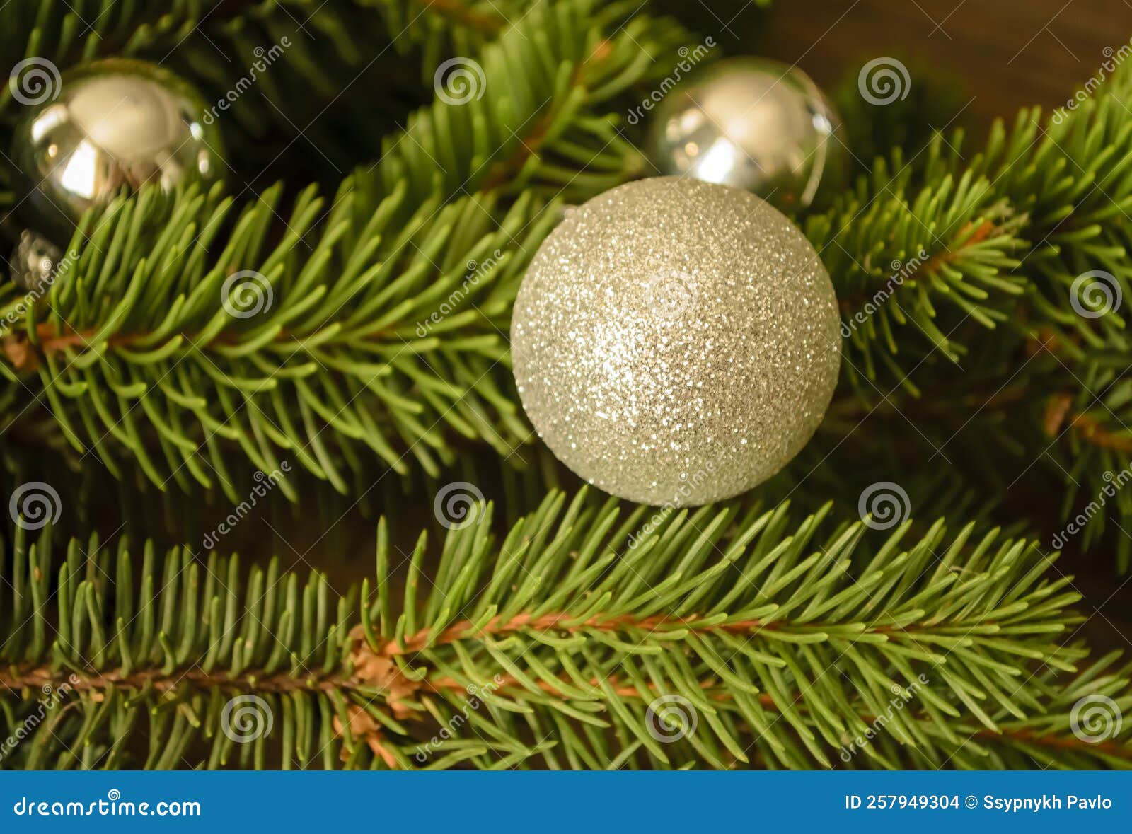 Christmas Balls on the Christmas Tree. Gray Christmas Balls Hang on the