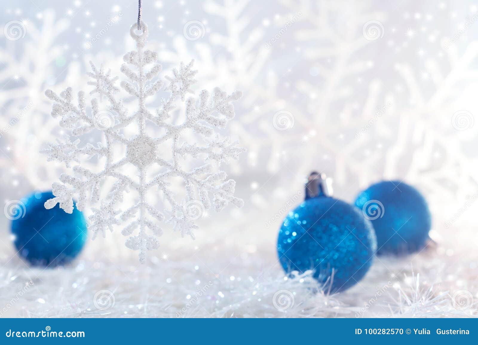 Download Christmas Blue Balls White Background With Snowflakes Selective Focus Stock Image