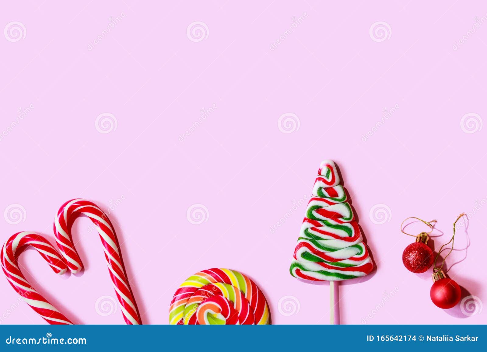 Christmas Candies and Sweets on a Pink Background. Stock Photo - Image ...