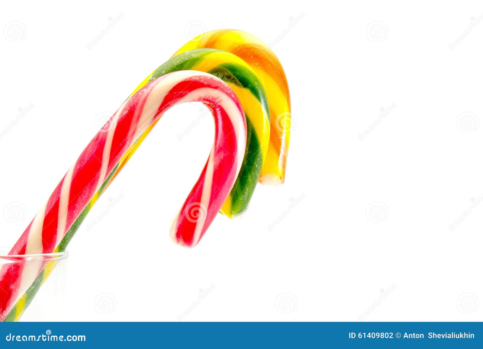 Christmas Candy Canes Red Yellow Green Isolated on White Stock Photo