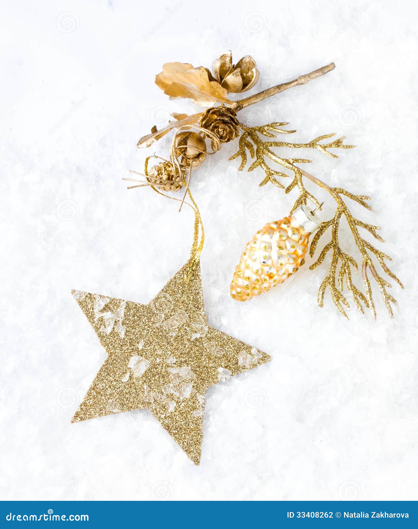 Christmas Card With Golden Star And Decorations On Snow 