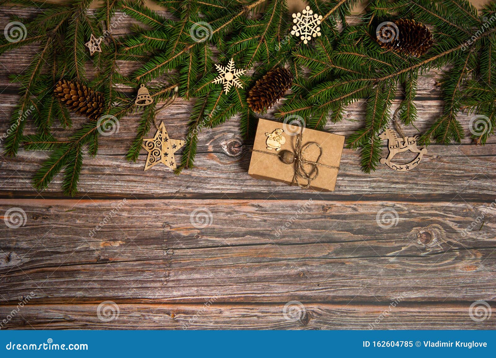 He Border is Made of Gift Boxes, Fir Branches, Cones, Wooden Decorative ...