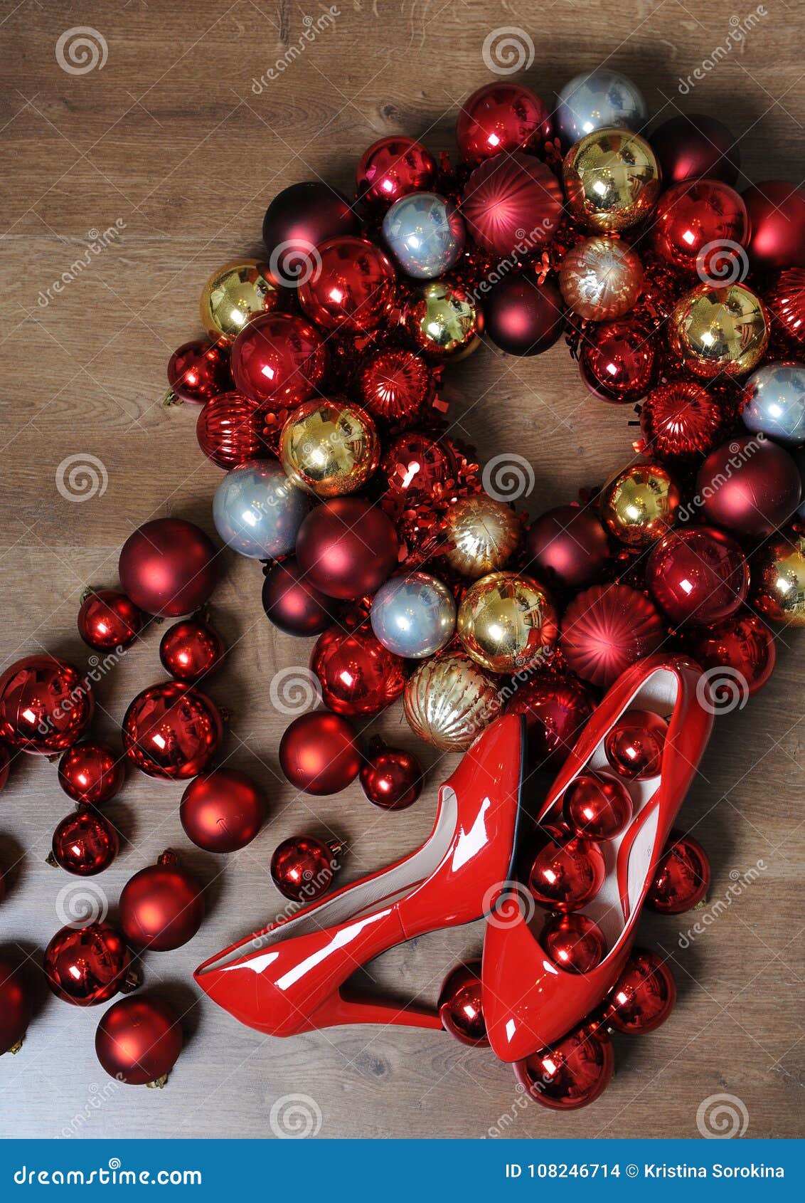 Christmas Composition. Red Lacquered Shoes with Heels and a Wreath of ...