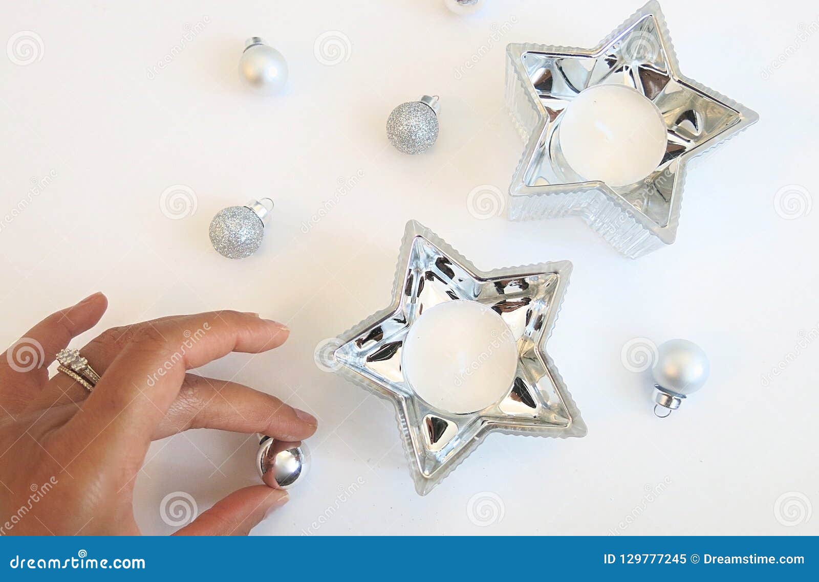 Christmas Composition Of Silver Ornaments And Silver Star