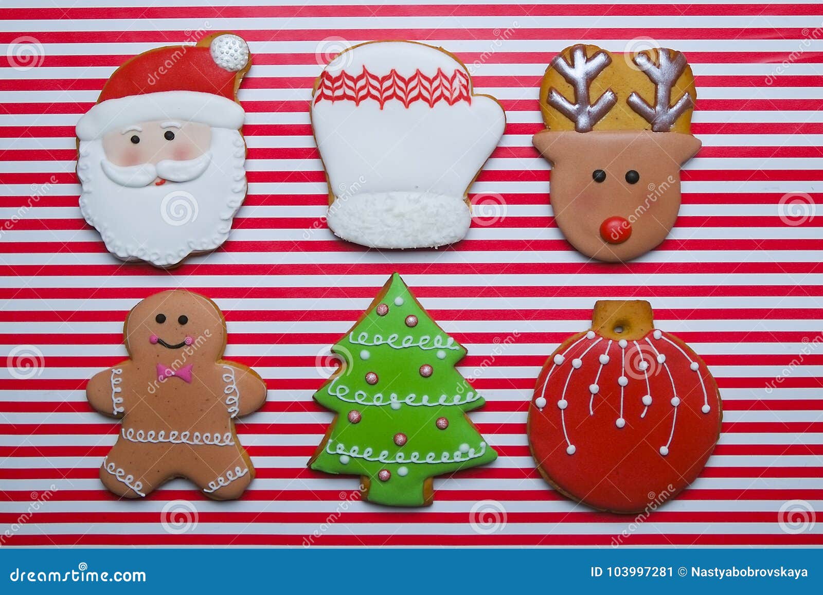 https://thumbs.dreamstime.com/z/christmas-cookies-stripe-background-top-view-various-types-gingerbread-flat-lay-characters-cookie-homemade-frame-wooden-table-103997281.jpg