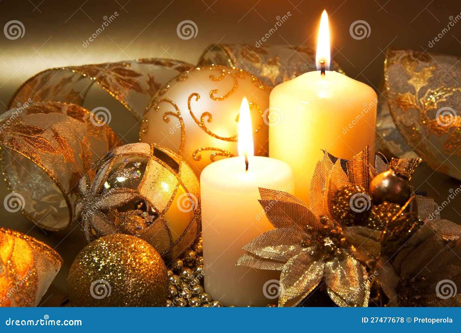 Christmas decoration with candles over dark background