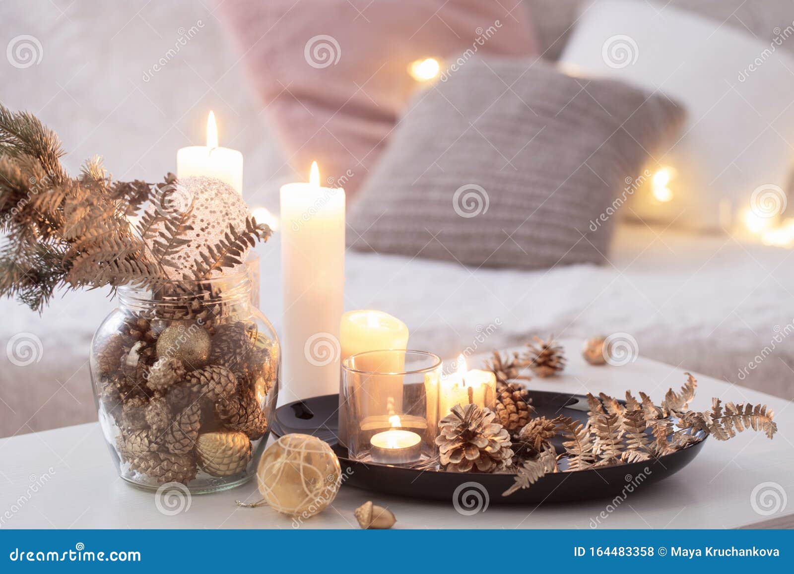 Christmas Decoration with Burning Candles on White Table Against the ...