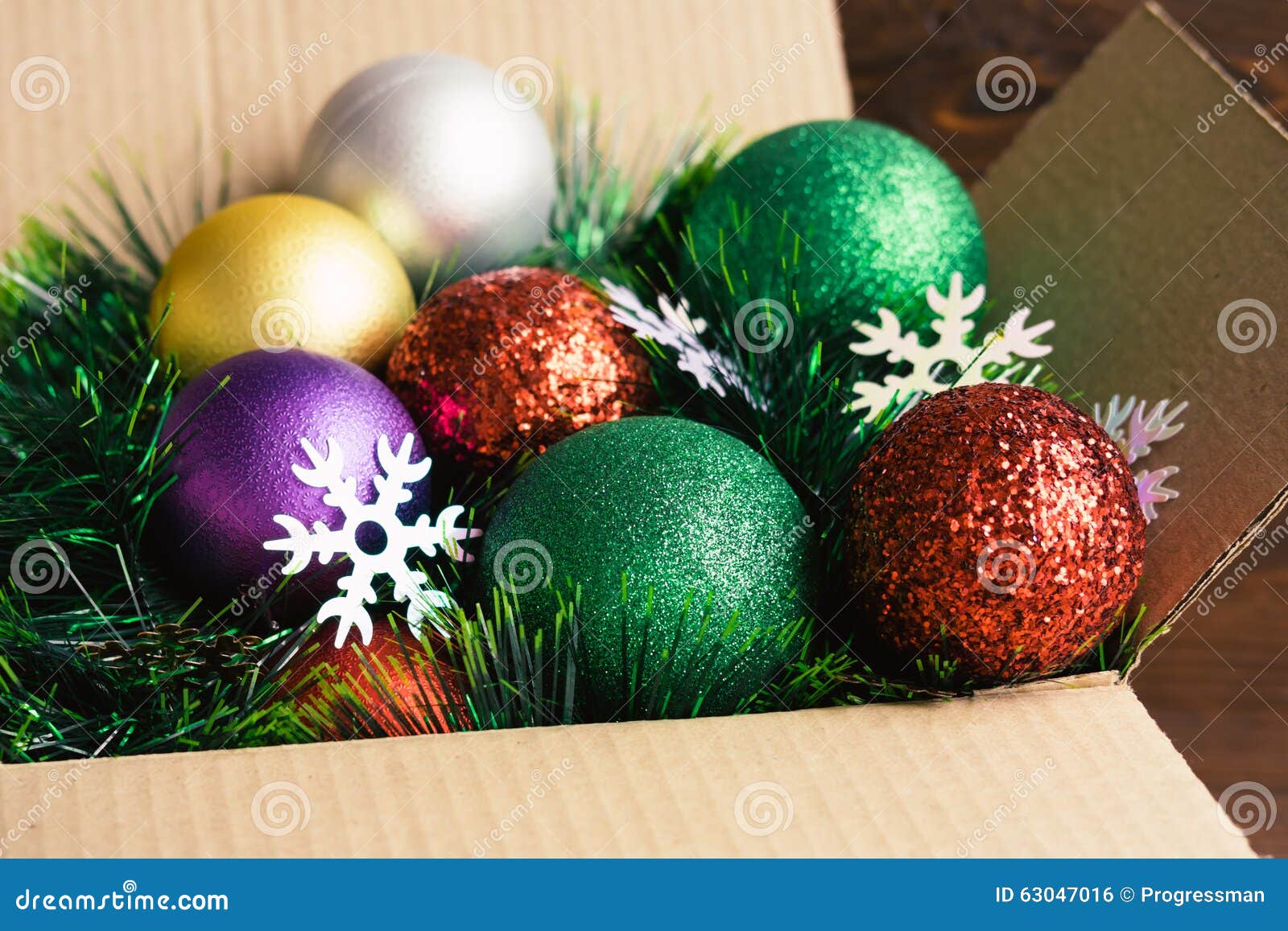 Download Christmas Decoration In A Cardboard Box A Wooden Background C Stock Image