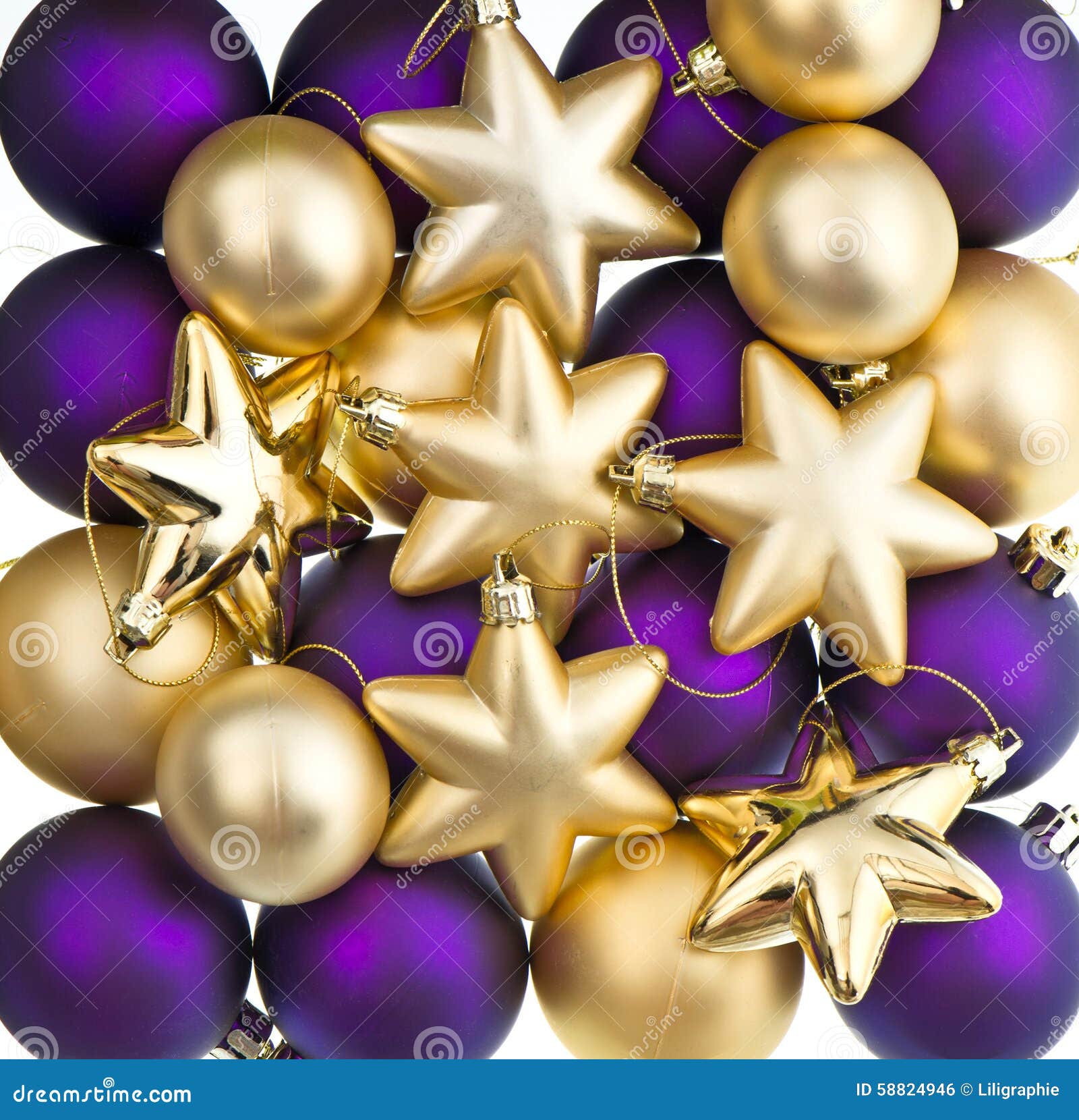 christmas decoration. lila and golden baubles, balls, stars